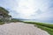 Carmel beach,  a long, wide, white sand beach. Carmel Beach is one of the most iconic spots on California