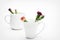 Carnation flowers in white cups