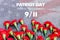 Carnations on the memorial with the American flag and the phrase patriots Day. September 11. We will never forget. Anniversary