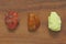 Carnelian, Amber, Sulfur. Collection of natural stones of minerals on a background of natural wood American black walnut.