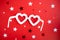Carnival glasses with frames in the shape of a heart on a red background. Holiday banner layout