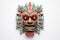 Carnival mask for the festival. Aztec traditional ceremonial mask on a white background. Warrior mask. Tribal totem