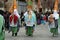 Carnival party. Happy people with traditional masks, costumes and painted face.