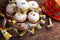 Carnival powdered sugar raised donuts with paper streamers. German berliner or krapfen for carnival