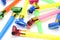 Carnival whistles of different colors on a white background