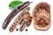 Carob pods and carob powder in the wooden bowl