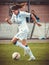 Carolina Mendes in action running with the soccer ball