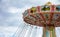 Carousel on cloudy sky background. Oktoberfest, Bavaria, Germany