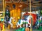 Carousel with horses. Bright attraction for children. Entertainment in the park. Driving in a circle. Children\\\'s fun