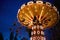 Carousel Merry-go-round in amusement park at a night city