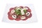 Carpaccio meat with parmesan cheese and arugula