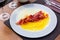 Carpaccio of pineapple and melon carpaccio with thinly sliced prosciutto