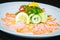 Carpaccio salmon in white plate