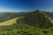 Carpathian mountains top view vivid clear weather day time green peak top landscape photography and blue sky background