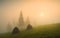 Carpathian valley covered with deep morning red fog