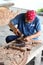 A carpenter in Ancient Siam in Bangkok.