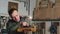 A carpenter is checking a cutting board he made from wood. Carpentry tool.