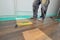 Carpenter doing laminate floor work