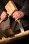 Carpenter or joiner using a chisel and mallet