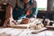 Carpenter, joiner at work in the workshop. Man at work on wood