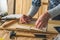 Carpenter making picture frame in workshop