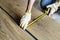 Carpenter man installing wooden floor