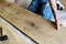 Carpenter man installing wooden floor