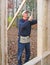 Carpenter nailing plywood sheathing