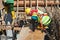 Carpenter sawing timber at the construction site