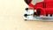 A carpenter saws a plywood cloth with an electric jig saw. Working fretsaw closeup.