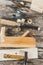 The carpenter tools on wooden bench, plane, chisel,mallet, hammer, tongs