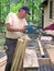 Carpenter using chop saw