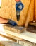 Carpenter using an electric screwdriver screwing wood screw into wood, Install and repair structures fixtures made from wood