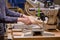 Carpenter using electric woodworking. close-up hands using electric equipment