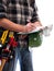 Carpenter with work tools on a white background. Carpentry