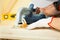 Carpenter at work using a circular saw