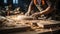 Carpenter working in his carpentry workshop. Close-up of the hands of a male working on a woodworking machine