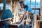 Carpenter working on wood with the circular saw