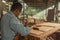 Carpenter working woodworking on the wooden desk