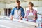 Carpenters Choosing Wood in Joinery