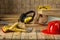 Carpentry tools goves helmet goggles hammer handsaw earphones nails handsaw on wooden background