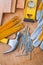 Carpentry tools nails claw hammer protective gloves level planks