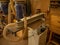 Carpentry workshop. Joiner\\\'s machines. A machine for sanding the surface of wood products