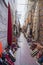 Carpet lined walls of an alley in the medina