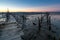 Carrasqueira Palafitic Pier in Comporta, Portugal at sunset