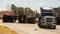 Carrboro NC, /US-March 10 2017:Logging truck overturns on highway