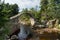 CARRBRIDGE, BADENOCH and STRATHSPEY/SCOTLAND - AUGUST 28 : Packhorse bridge at Carrbridge Scotland on August 28, 2015