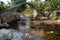 CARRBRIDGE, BADENOCH and STRATHSPEY/SCOTLAND - AUGUST 28 : Packhorse bridge at Carrbridge Scotland on August 28, 2015