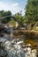 CARRBRIDGE, BADENOCH and STRATHSPEY/SCOTLAND - AUGUST 28 : Packhorse bridge at Carrbridge Scotland on August 28, 2015