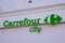 Carrefour city brand logo and text sign town store market entrance shop supermarket